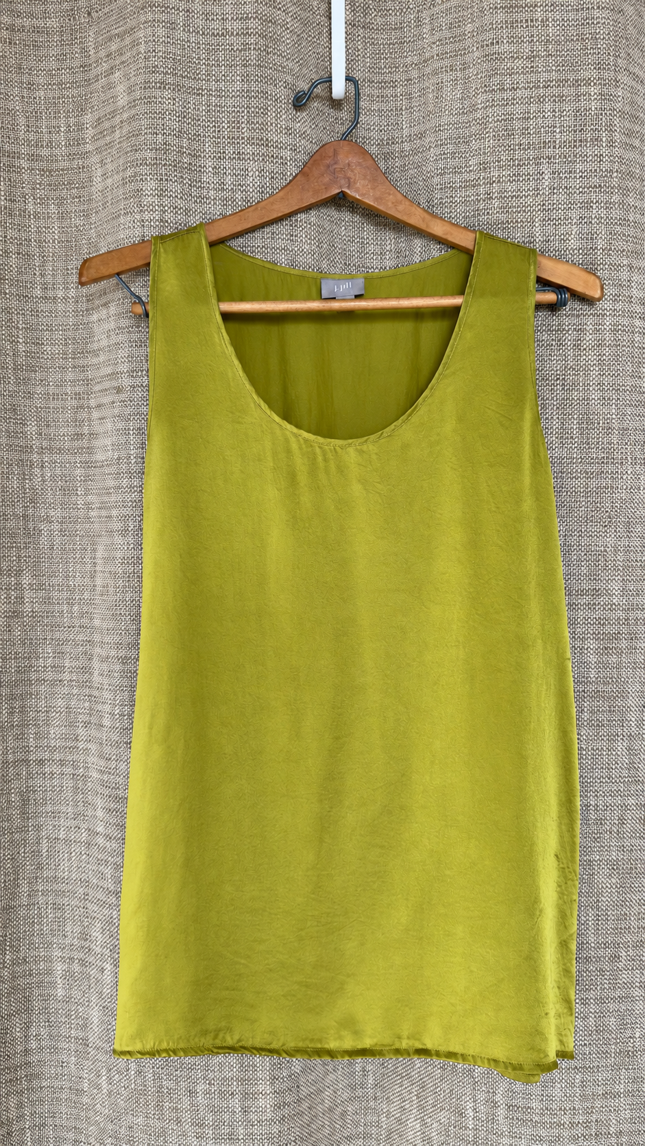 J.Jill chartreuse silk top on hanger, front view
