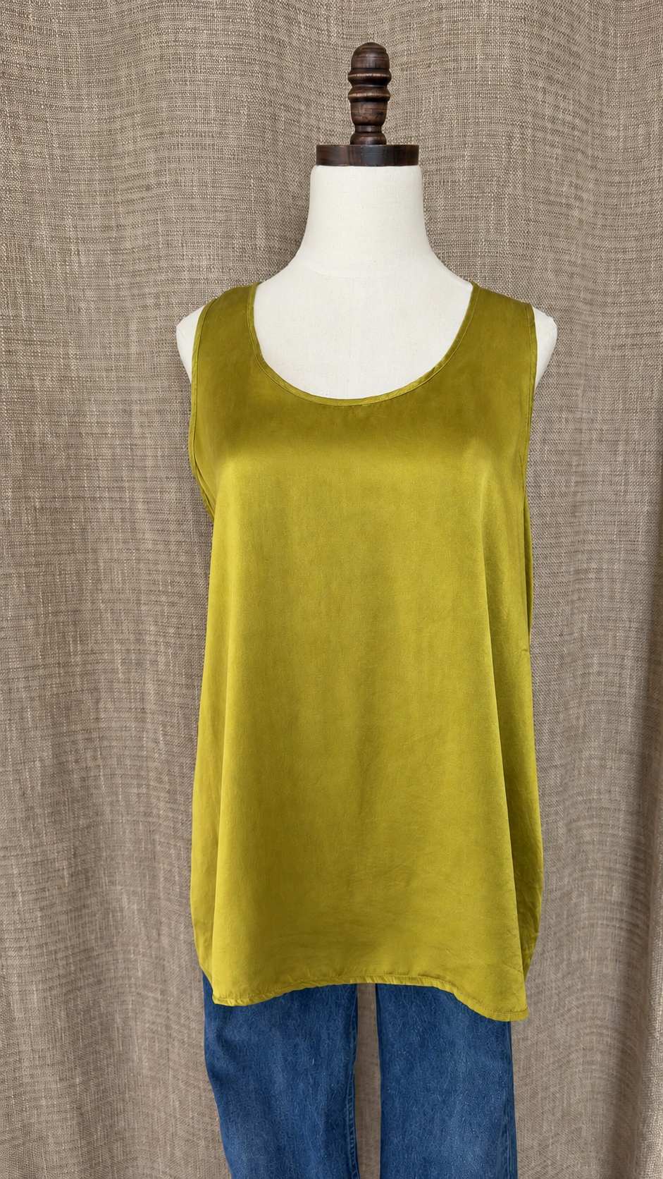 J.Jill chartreuse silk top on mannequin, front view