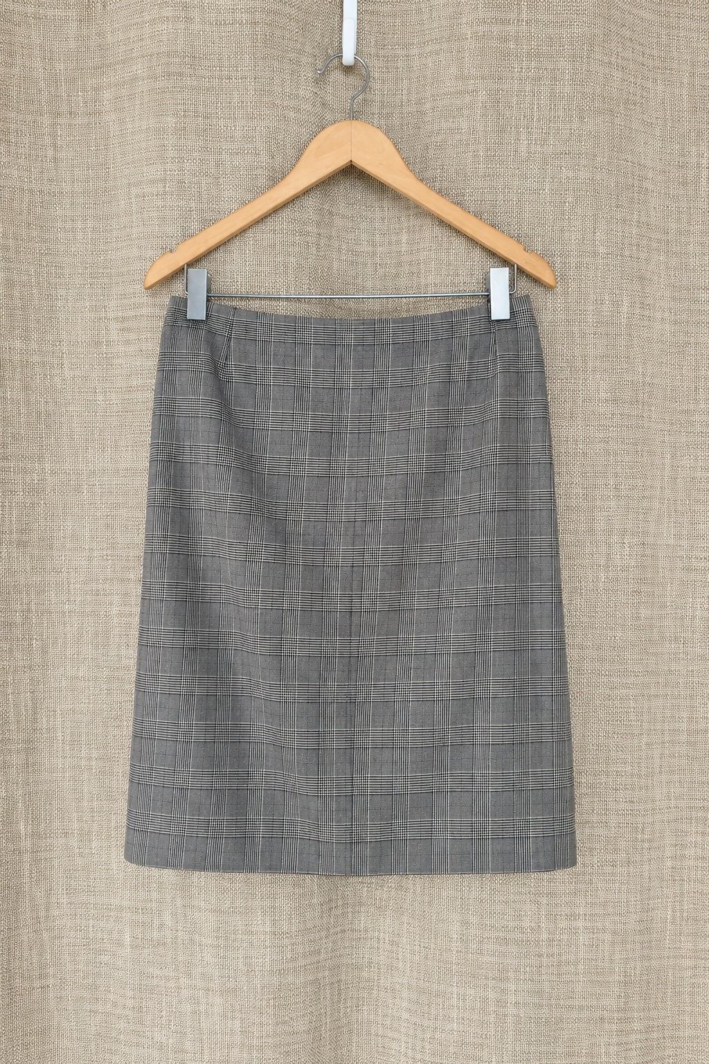 Akris punto plaid wool skirt on hanger, front view