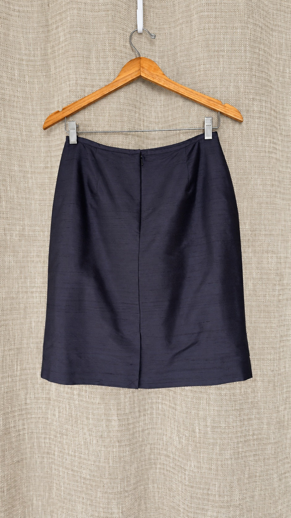 Casual Corner dark silk skirt on hanger, back view