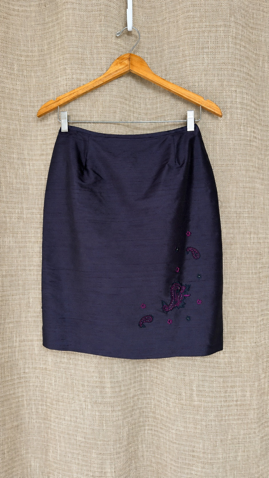 Casual Corner dark silk skirt on hanger, front view