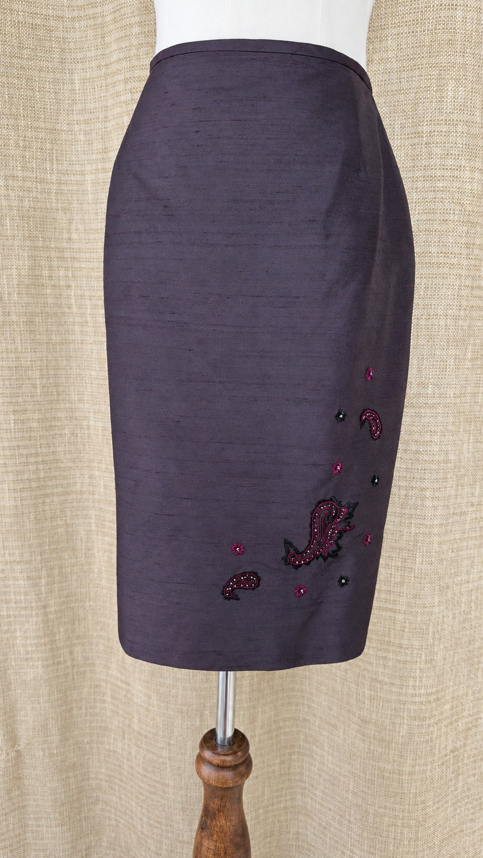 Casual Corner dark silk skirt on mannequin, front view