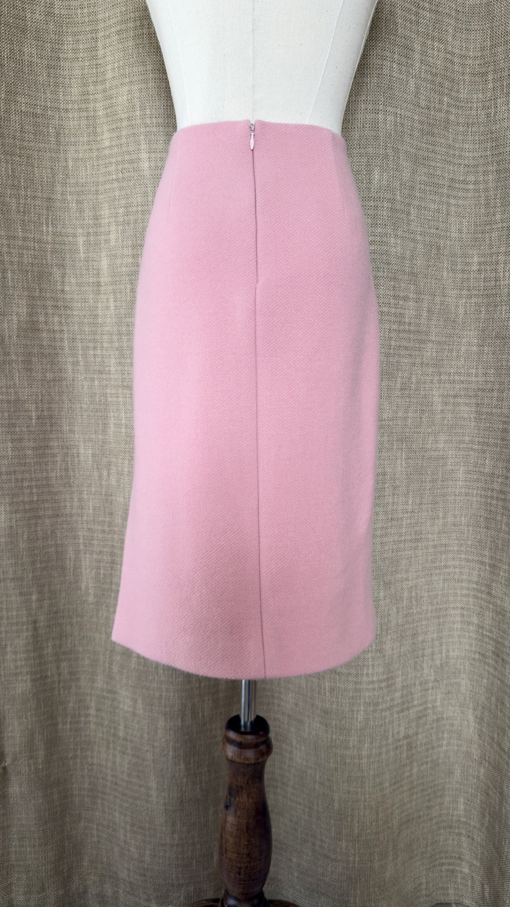 Light pink wool-angora skirt on mannequin, back view