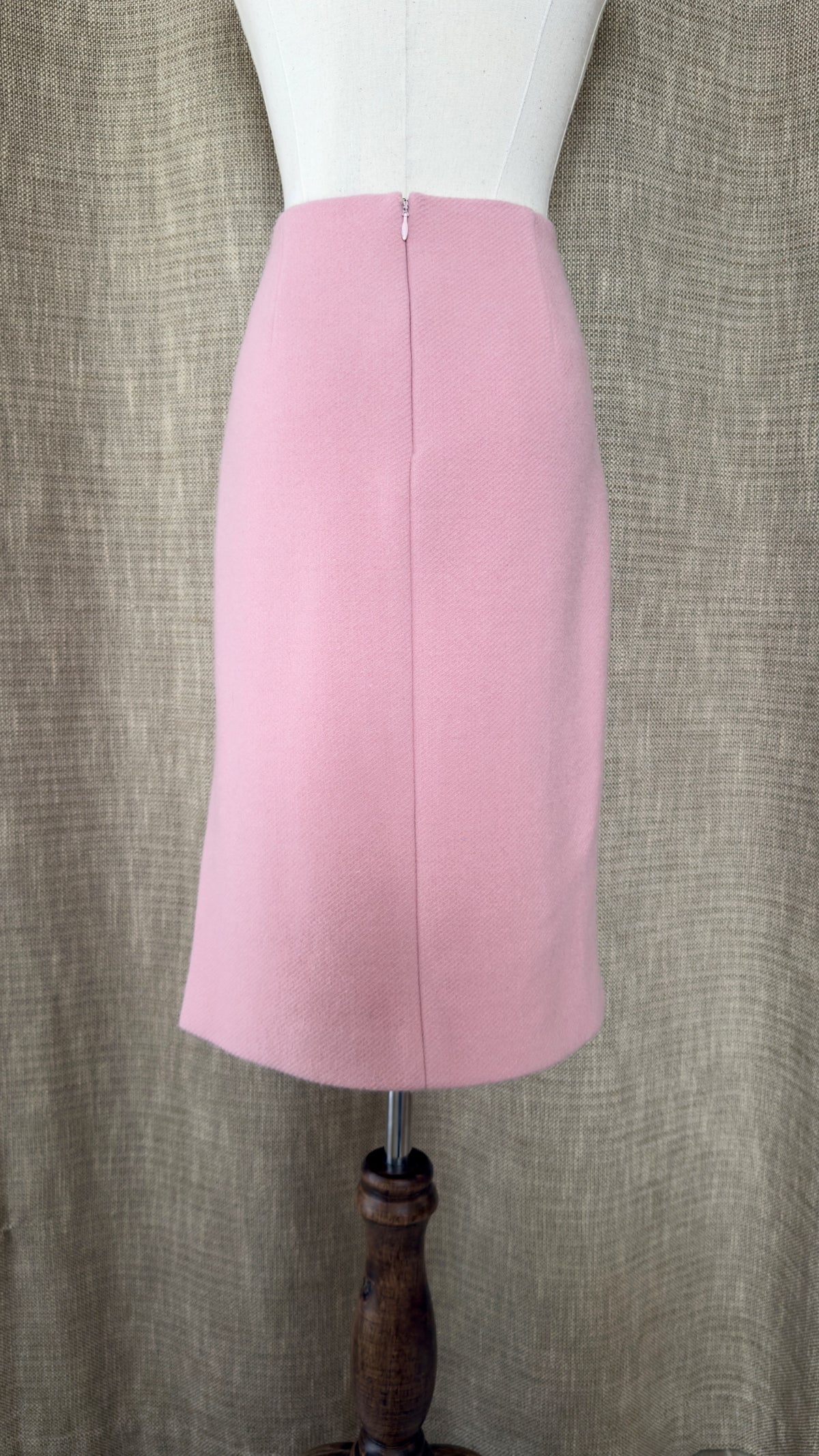 Light pink wool-angora skirt on mannequin, back view
