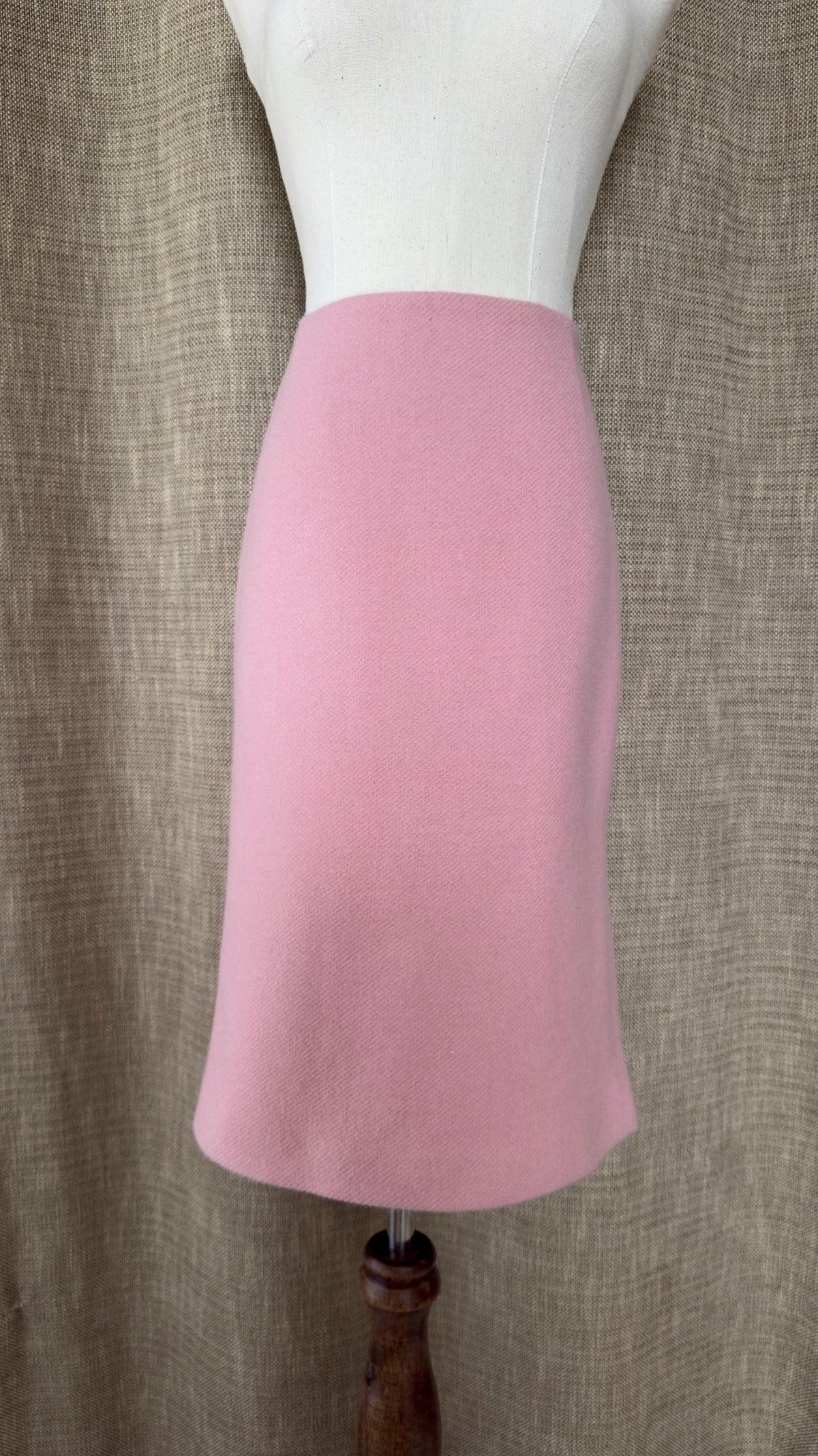 Light pink wool-angora skirt on mannequin, front view