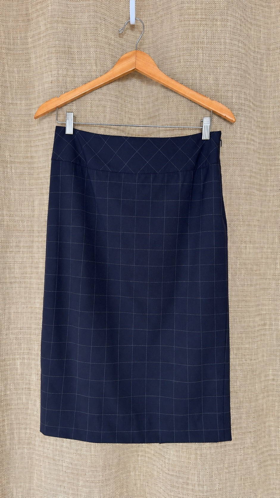Façonnable dark windowpane wool skirt on hanger, front view