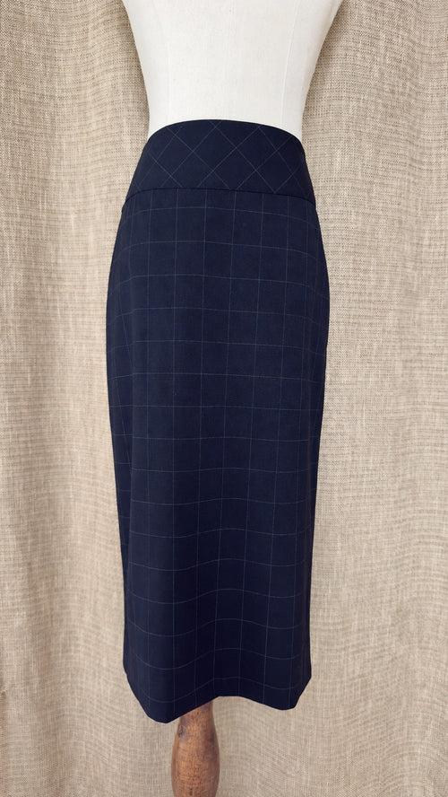 Façonnable dark windowpane wool skirt on mannequin, front view