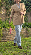 Jones New York camel silk blazer styled outdoors