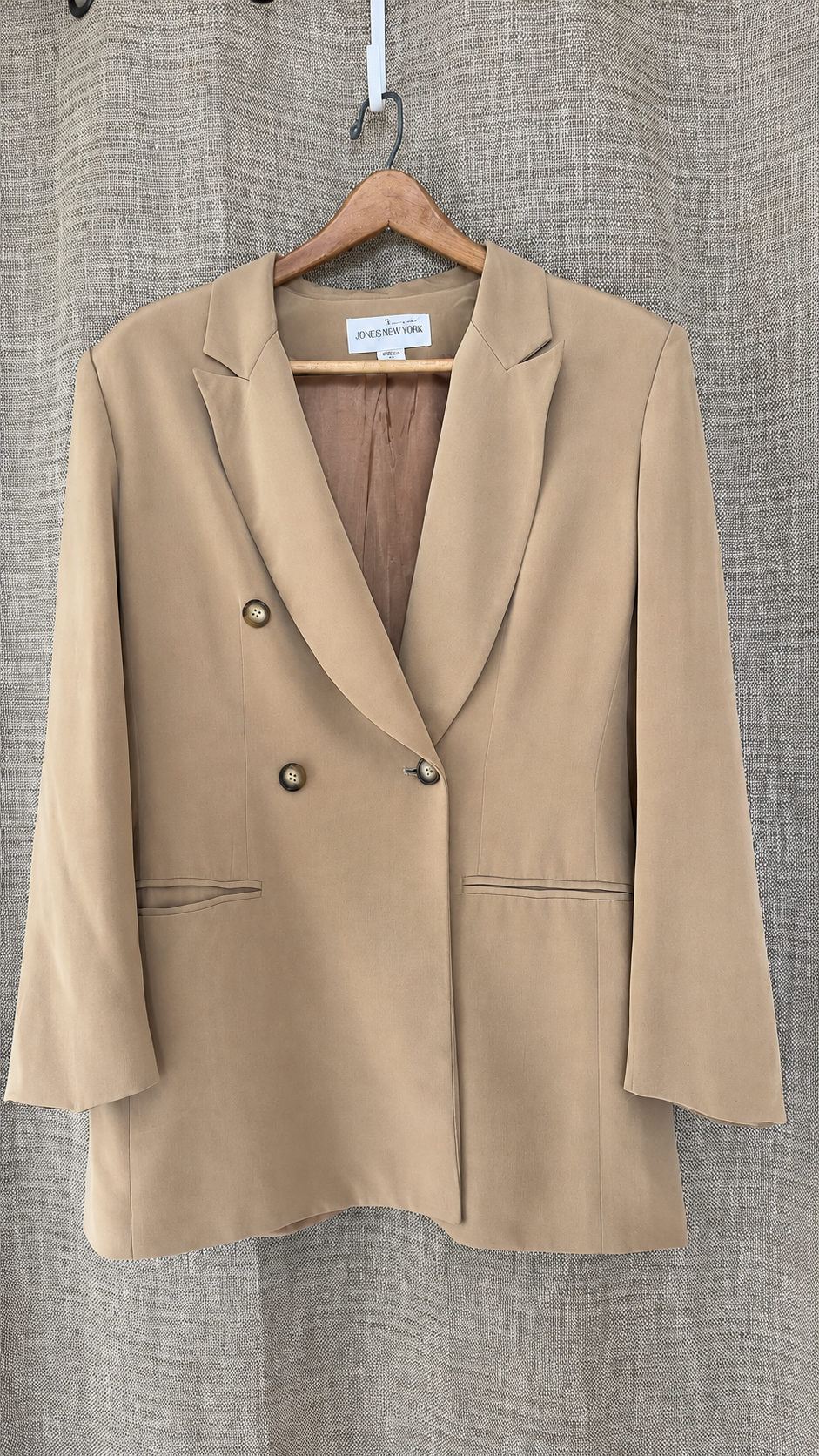 Jones New York camel silk blazer hanging, front view