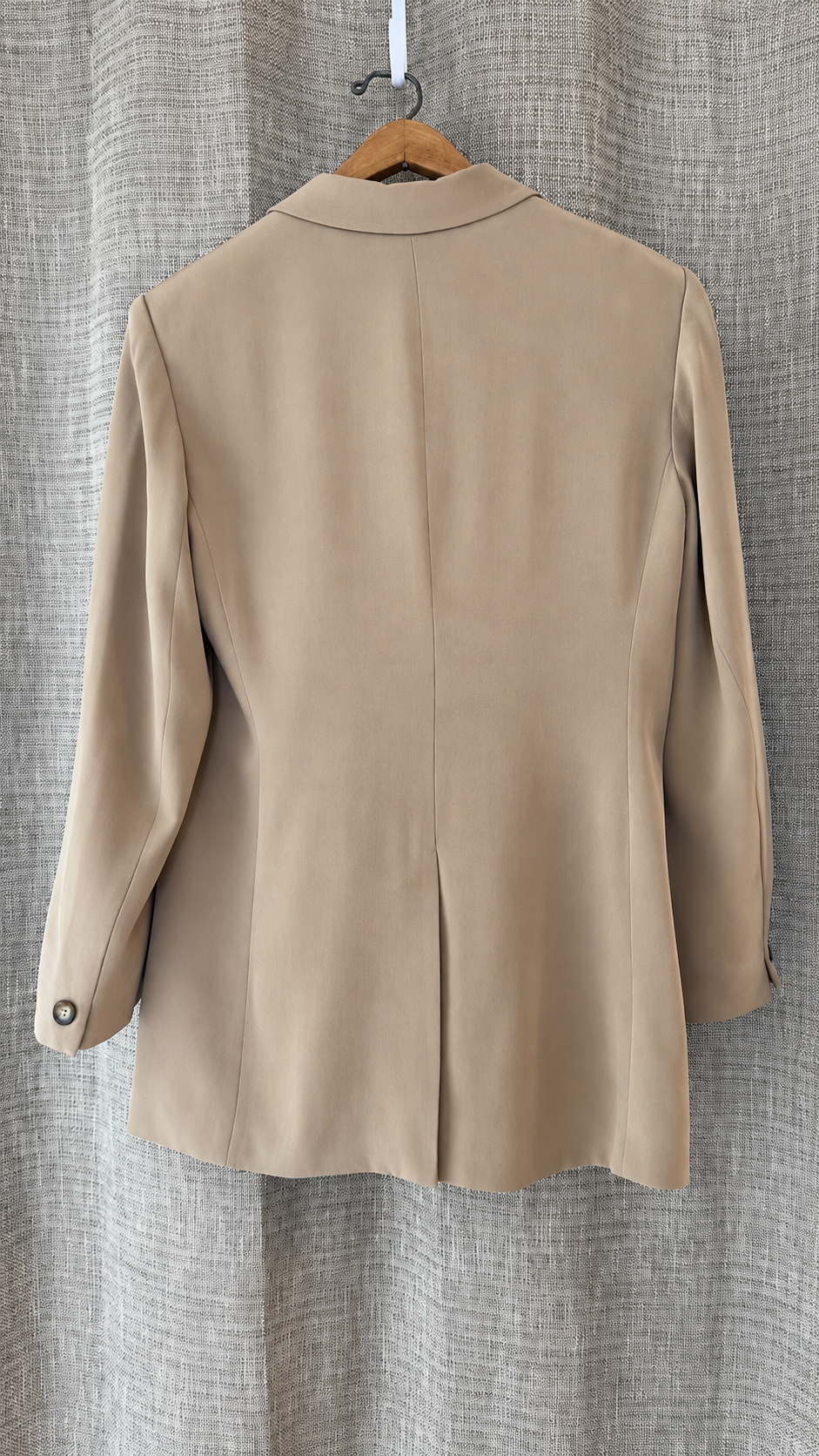 Jones New York camel silk blazer hanging, back view