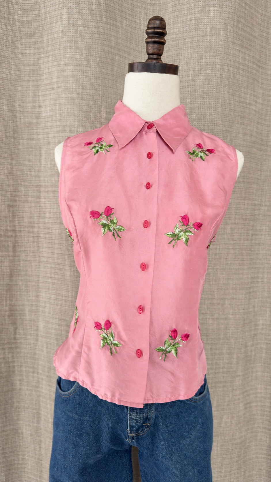 Vision Apparel pink silk top on mannequin, front view